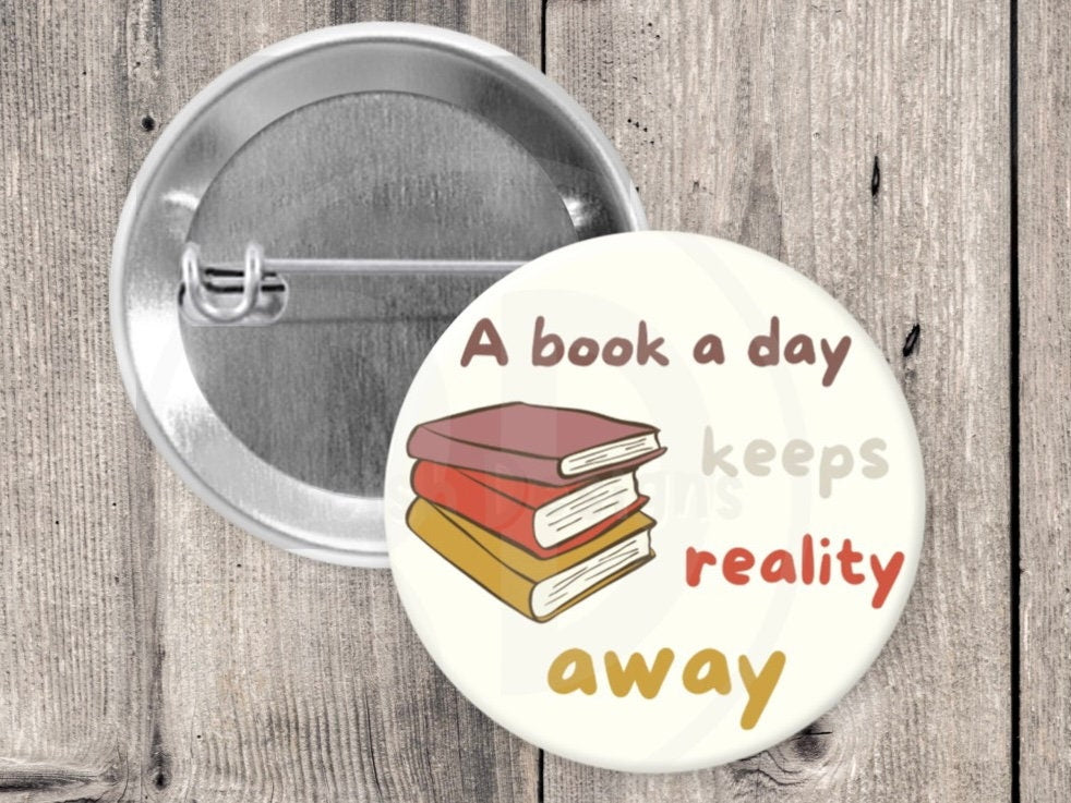 A book a day keeps reality away pin