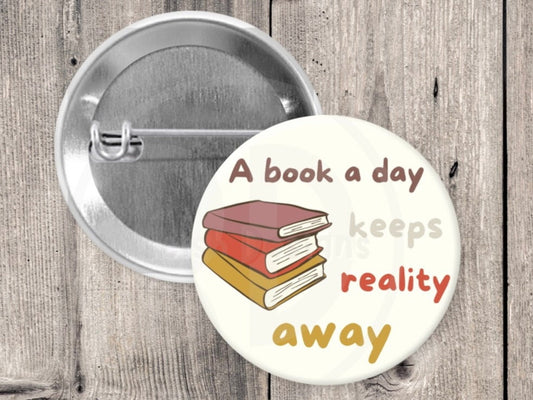 A book a day keeps reality away pin